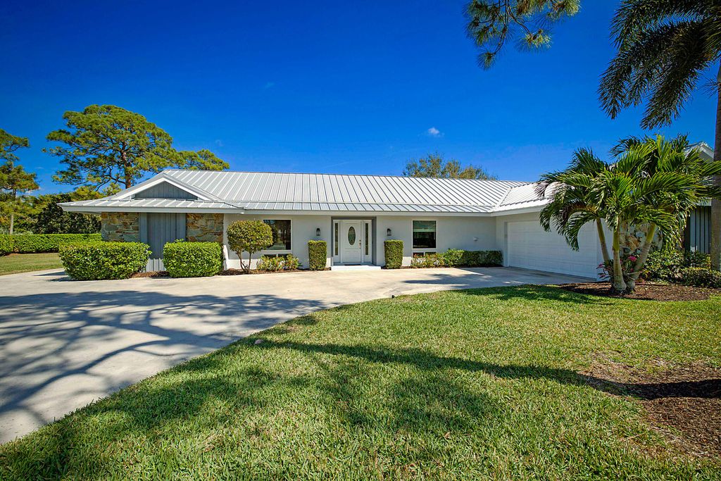 Photo of 10356 Seagrape Way, Palm Beach Gardens, FL 33418 (MLS # R11169766)