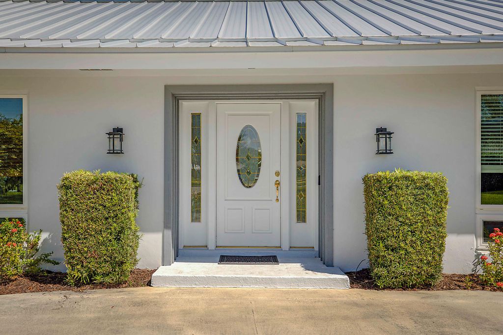 Photo of 10356 Seagrape Way, Palm Beach Gardens, FL 33418 (MLS # R11169766)