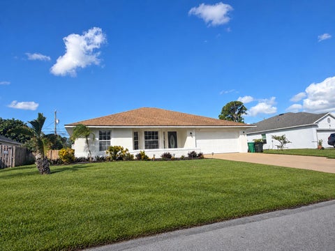 Photo of 2912 SW ROSETTA Street, Port Saint Lucie, FL 34953 (MLS # B26090620)