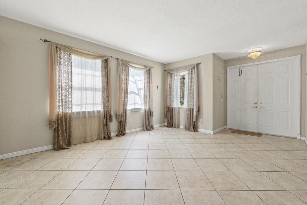 Photo of 1500 Running Oak Lane, Royal Palm Beach, FL 33411 (MLS # R11118152)