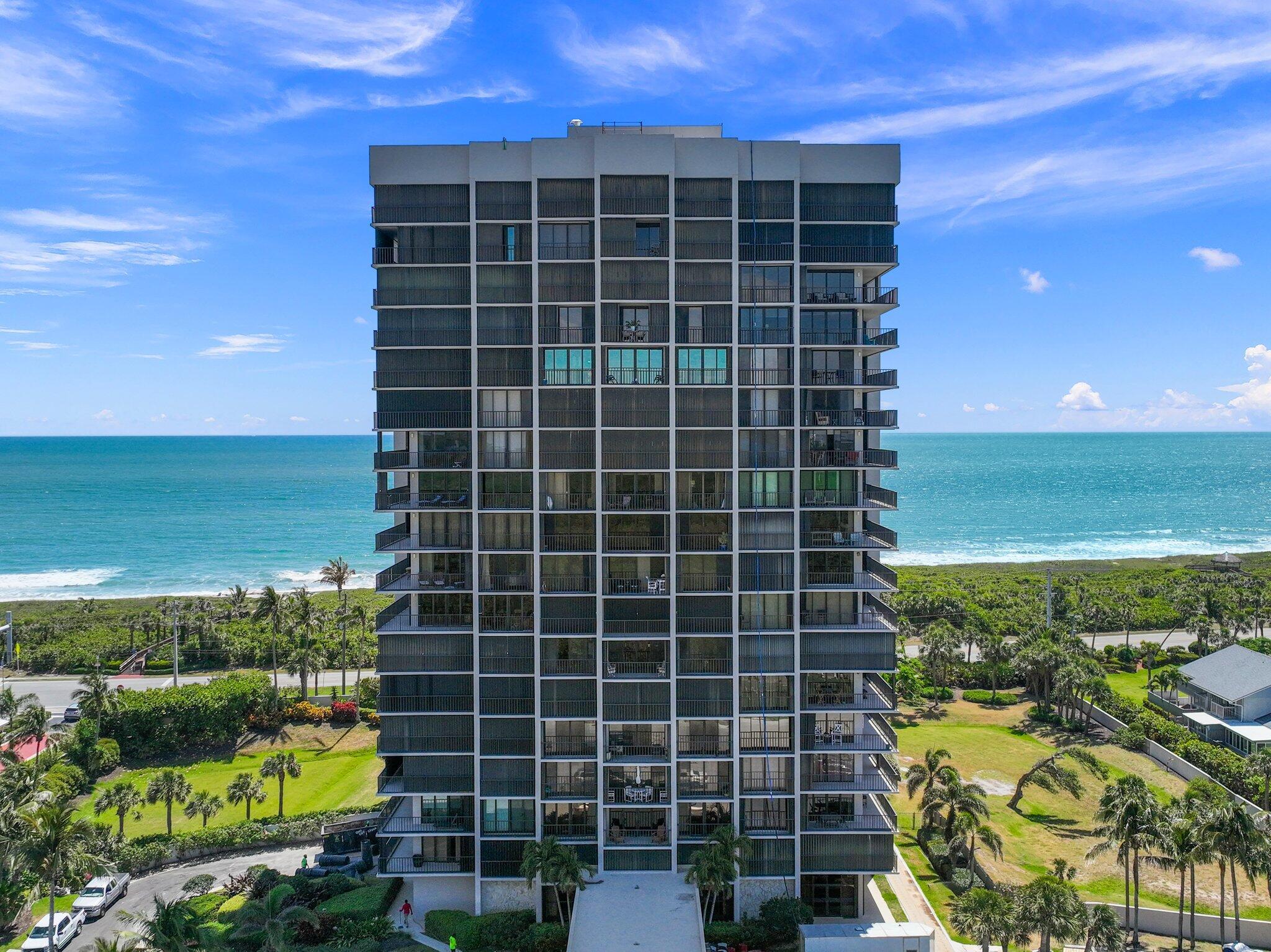 FURNITURE NO LONGER IN UNIT! Luxury Coastal Living - 5th-Floor SW Corner Condo-Experience breathtaking sunrises & sunsets from this stunning 2-BR, 2-BA condo with floor-to-ceiling sliding doors and a wraparound balcony. This beautifully remodeled unit offers high-end finishes, including granite countertops, tray ceiling, and SS appliances. Resort style amenities include heated pool, spa, fitness centers, billiards, tennis, pickleball, private beach access, fishing dock & kayak launch. Extra storage, underground parking. Located in one of Hutchinson Island's most well-built solid concrete buildings. All required inspections completed in 2024. Don't miss out on this exceptional opportunity to own a piece of paradise--schedule your private tour today!