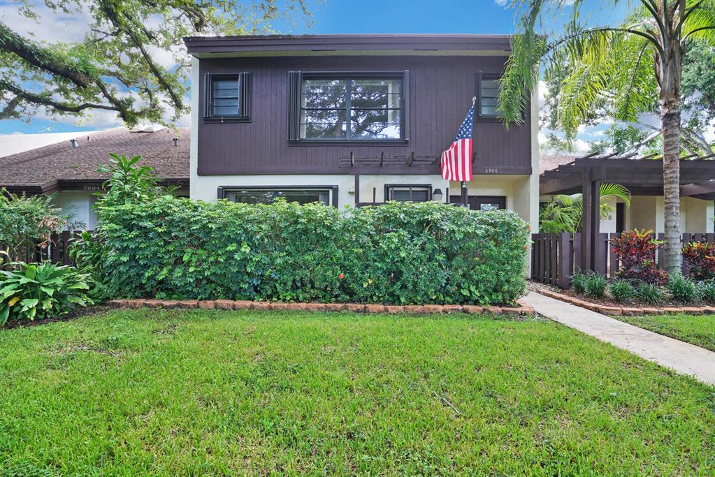 This large beautiful townhome is located directly across the street from TY Park. Open loft style living room dining room with gorgeous cedar vaulted ceiling. Also one bedroom and full bathroom downstairs. Loft style master bedroom with walk in closet and additional bedroom and full bathroom upstairs. Community comes with tennis court, dog run, pool. Updated kitchen, 2016 roof, 2015 A/C, complete hurricane protection.