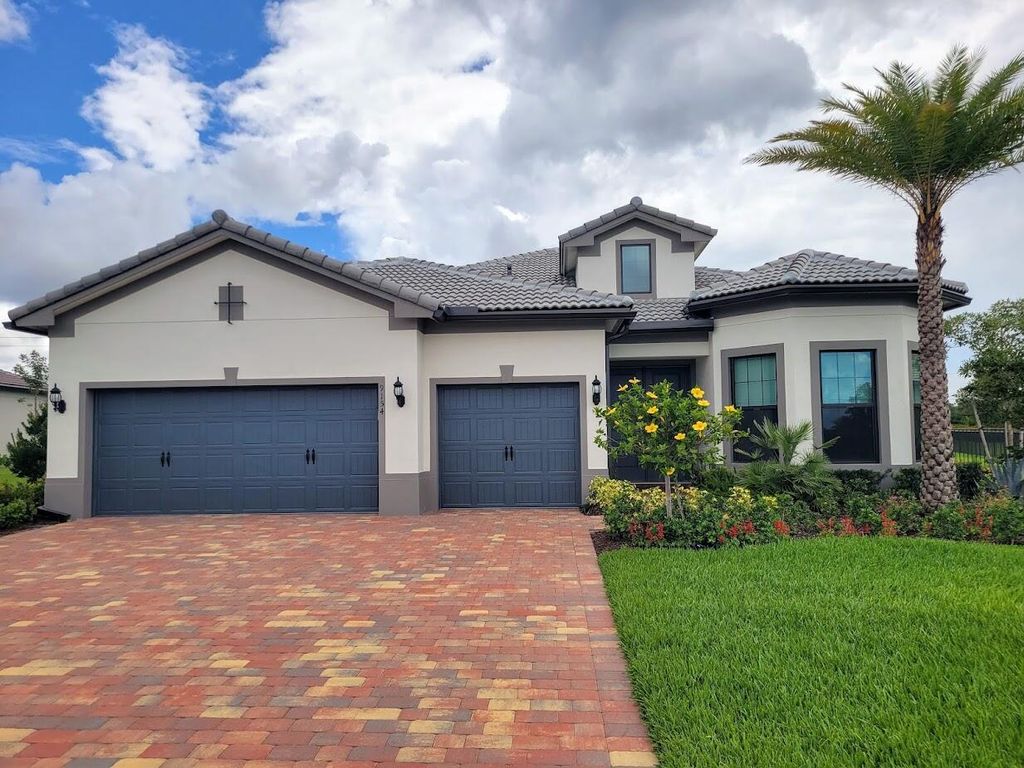 Photo of 9154 Balsamo Drive, Palm Beach Gardens, FL 33412 (MLS # R10805343)