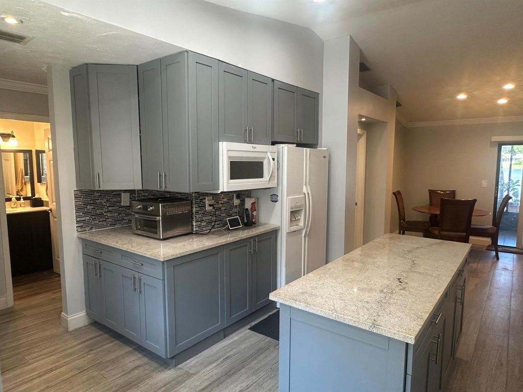Photo of 37 Mayfair Lane, Boynton Beach, FL 33426 (MLS # R11102979)