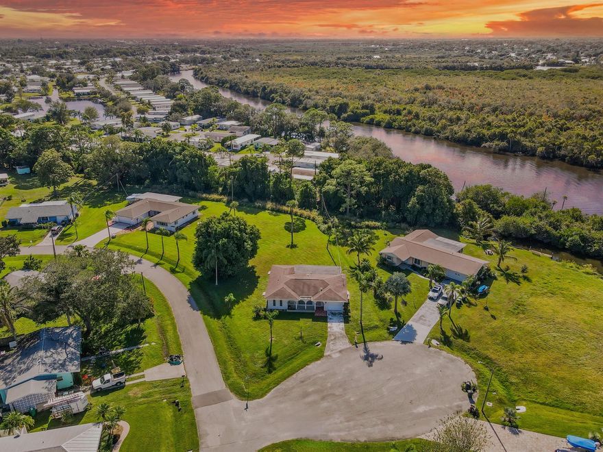 Your Florida dream awaits! Discover the ultimate freedom with this perfectly positioned home, offering a rare blend of space, accessibility, oversized lot and zero restrictions. This is more than just a house; it's an exceptional opportunity for families, retirees, and boaters seeking a peaceful life without sacrificing convenience. Location, Location, Location: Perfectly situated near the boat ramp for easy water/ocean access, major highways, essential shopping and the stunning local beaches.
