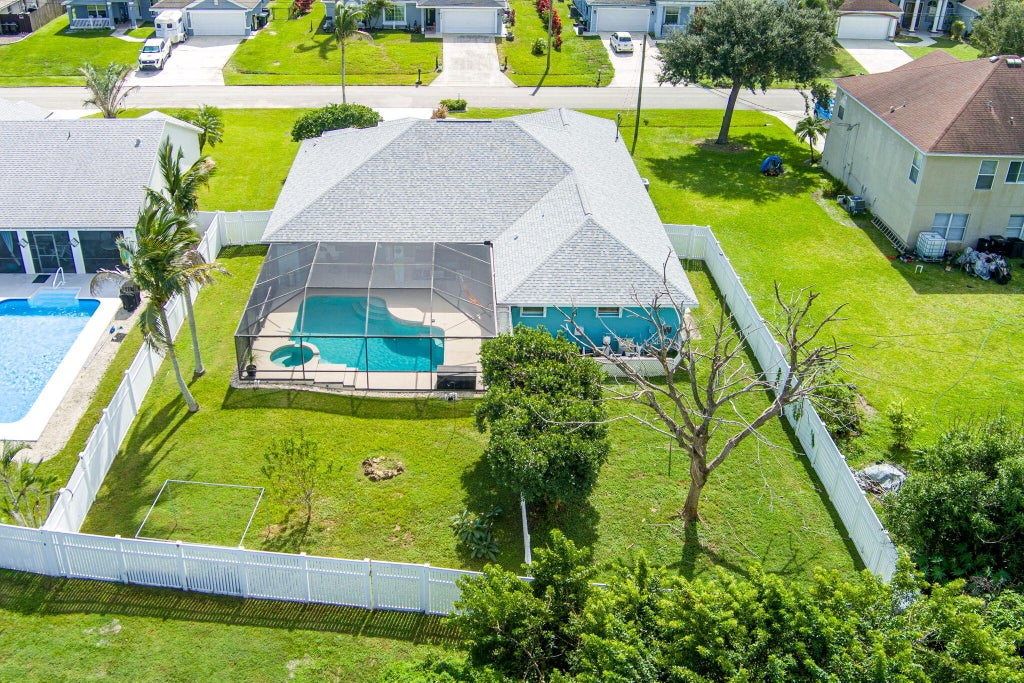 Photo of 6133 NW GINGER Lane, Port Saint Lucie, FL 34986 (MLS # B26092238)