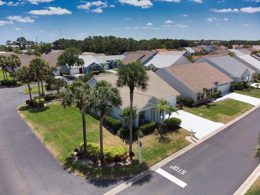 Don't Miss This Beautiful Move-In Ready Home in Kings Isle, a 55+ Community in St. Lucie West! This charming 2-bed 2-bath CBS home is perfectly situated on a spacious corner lot, offering extra privacy and a serene backyard. Inside, you'll find a desirable split floor plan that provides added comfort and separation for guests, along with an open kitchen and family room layout that creates a bright, airy feel--perfect for both relaxing and entertaining. The living space flows seamlessly out to a spacious enclosed lanai, ideal for enjoying Florida's beautiful weather year-round. The master bedroom features an ensuite bath with a walk-in shower and a large walk-in closet, offering comfort and ample storage. AC 2023, WH 2023, Roof 2018.