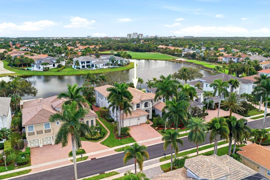 Introducing a rare Casa Del Sol estate within Frenchman's Reserve, encompassing over 5,300 square feet with five bedrooms, five full baths, and two half baths, set on a premier lakefront homesite with long, uninterrupted waterway views extending across the Arnold Palmer championship golf course. This is one of the most visually compelling settings within the community—where expansive water, manicured fairways, and open sky converge to create a truly elevated backdrop. A full golf membership is available for purchase, offering immediate access to one of Palm Beach County's most exclusive club experiences. From the moment you enter through the double doors, the residence unfolds with dramatic scale—soaring 24-foot and volume ceilings, marble and hardwood flooring, intricate crown molding, and expansive walls of floor-to-ceiling glass that flood the interiors with natural light while perfectly framing the sweeping lake and fairway vistas. A dramatic two-story library with custom built-ins and rich wood paneling, along with a spacious loft overlooking the main living area, adds architectural presence and depth throughout.  The gourmet island kitchen is thoughtfully designed for both everyday living and refined entertaining, appointed with a Wolf wall double oven, Sub-Zero refrigerator, Thermador gas cooktop, Bosch dishwasher, Monogram microwave, and Zephyr hood. Custom cabinetry, generous counter space, a pantry, breakfast bar, and breakfast nook flow seamlessly into the family room, while multiple dining and entertaining areas enhance the home's functionality and flow.  The primary suite is a private retreat, positioned to capture serene lake and fairway views, and complemented by a sitting area, dressing vestibule, and dual walk-in closets with custom storage. The spa-inspired bath features marble-appointed finishes, dual vanities, a deep soaking tub, and a glass-enclosed walk-in shower, all thoughtfully designed with natural light.  Outdoor living is equally impressive, centered around a custom pool with sun shelf and swim-out design, heated pool and spillover spa, and a covered lanai with a fully equipped summer kitchen featuring a Sedona grill and sink. The expansive outdoor terrace is perfectly positioned to embrace the home's long waterway and golf course backdrop, creating a true resort-style setting.  Additional highlights include a three-car garage, new A/C units, and a full-size laundry room with Electrolux washer and dryer, all contributing to a layout that lives like a true estate home.  This offering represents more than a home—it is a lifestyle defined by exclusivity and refinement. Frenchman's Reserve is one of Palm Beach Gardens' most prestigious country club communities, offering championship golf, tennis and pickleball, a state-of-the-art fitness center, spa, and a resort-style clubhouse with exceptional dining. A full golf membership is available for purchase, unlocking immediate access to the club's premier golf, social, and lifestyle offerings for those seeking the highest level of country club living.