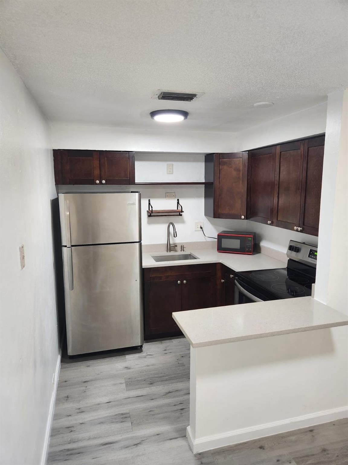 Come and see this beautifully updated two bedroom one bathroom unit, nestled in this quiet community in Sunrise. Property recently renovated and boasts brand new vinyl flooring. Kitchen was Upgraded with Quartz Countertop and new Stainless Steel Sink and Faucet. Unit will not last. Tenants must be Properly Screened. Credit report and background check required.