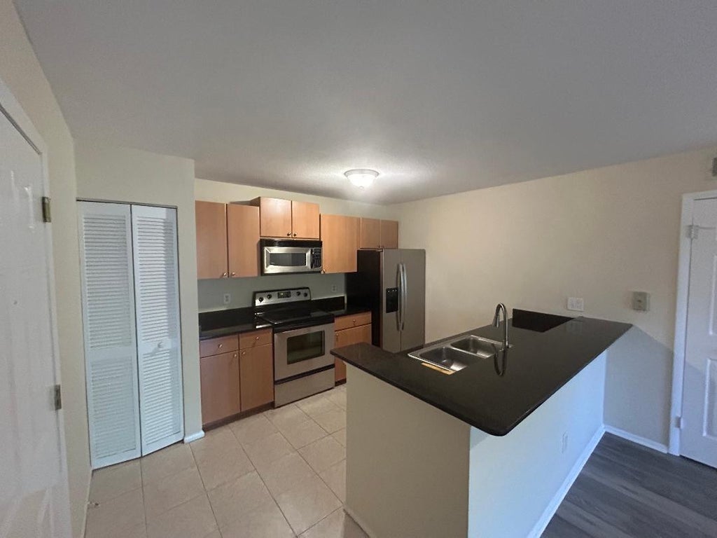 Photo of 1825 Palm Cove Boulevard #7-107, Delray Beach, FL 33445 (MLS # F10496945)