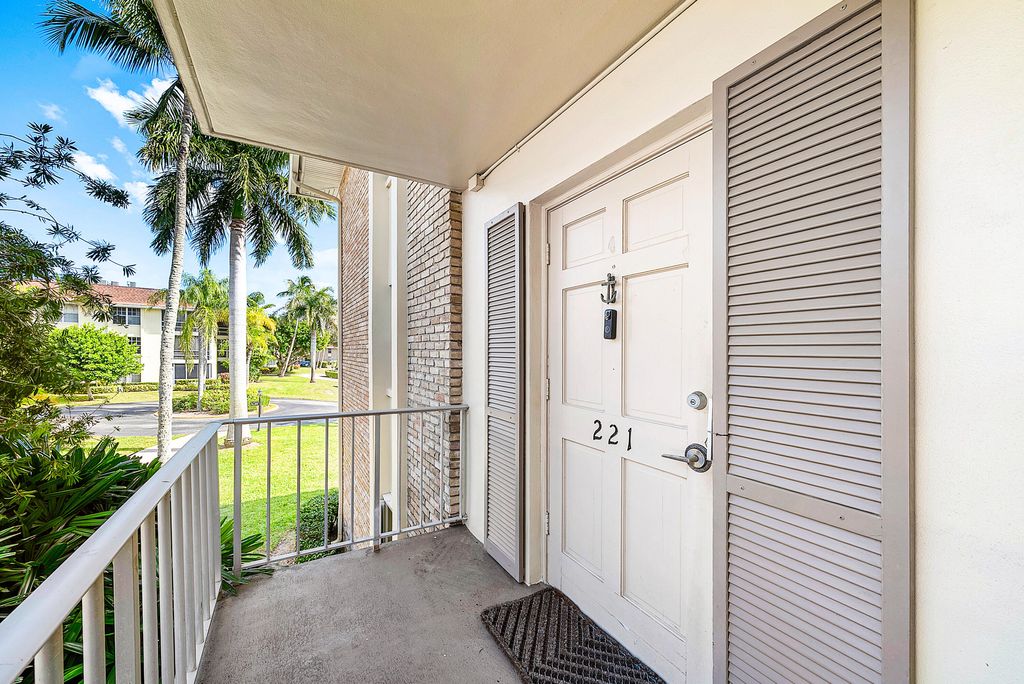 Photo of 5540 Tamberlane Circle #221, Palm Beach Gardens, FL 33418 (MLS # B26043632)