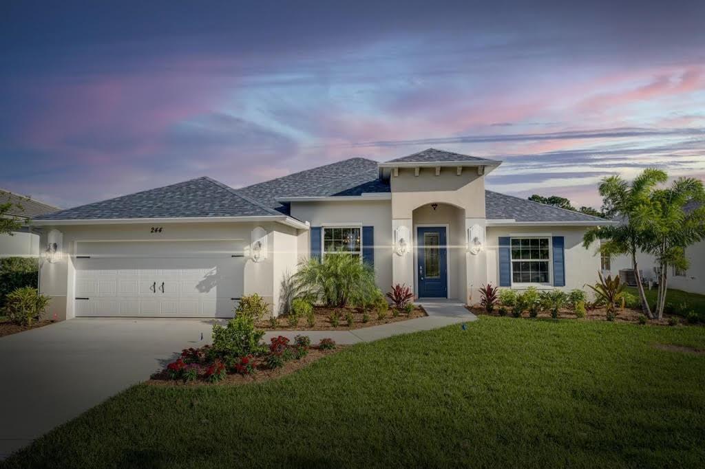 Rare Opportunity to Own Your Piece of Paradise! Back on the Market due to buyers home sale, sadly falling through. Here you discover modern elegance in this custom 3 bedroom with a den, Groza 2022 Aurora model, where high-end finishes meet exceptional design. Architectural delight welcomes you to your oversized, nicely landscaped property, before walking through the gorgeous door into your design dream, complete with custom wood crown molding, woodwork and plantation shutters adorning the windows, along with custom lighting and fans throughout. The formal dining room with attractive wainscoting sets the scene for memorable gatherings. The gourmet kitchen is a culinary treasure, offering quartz countertops, 42'' cabinets, a true exhaust fan, spacious center island with seating,