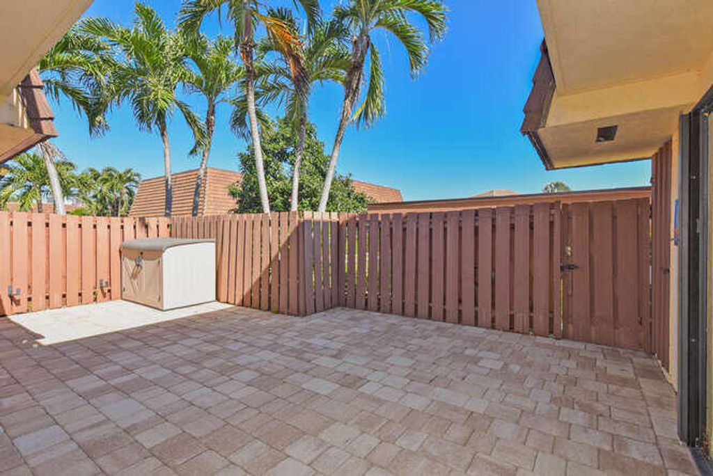 Photo of 11 Atrium Circle #D, Atlantis, FL 33462 (MLS # R11136678)