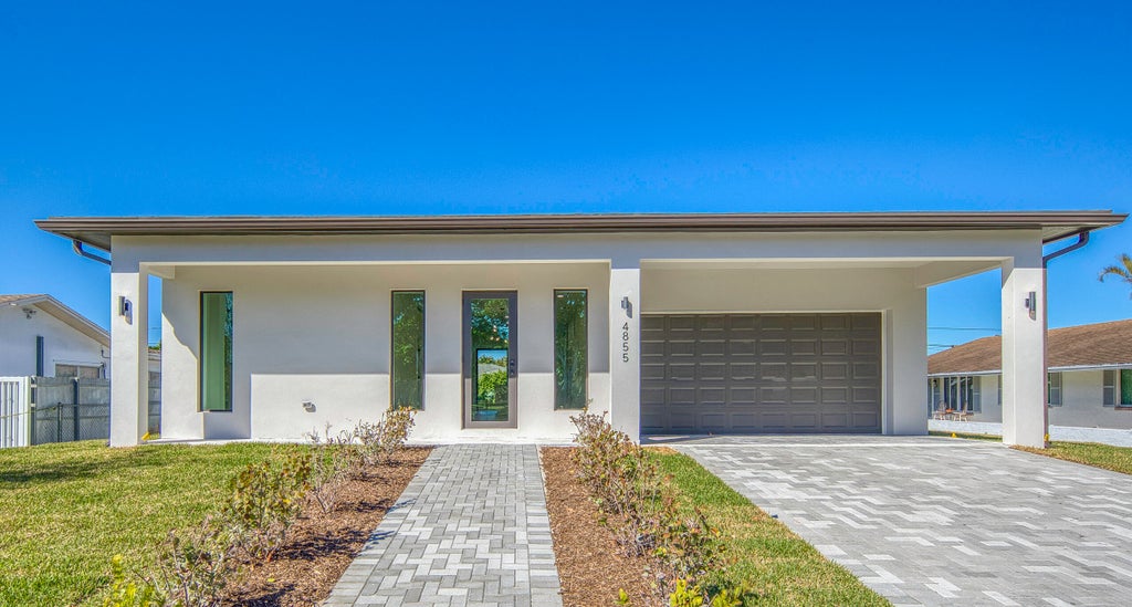Photo of 4855 Elmhurst Road, West Palm Beach, FL 33417 (MLS # R11166589)