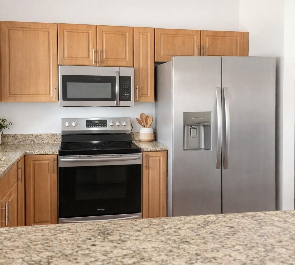 Photo of 841 SE Cavern Avenue, Port Saint Lucie, FL 34983 (MLS # B26003964)