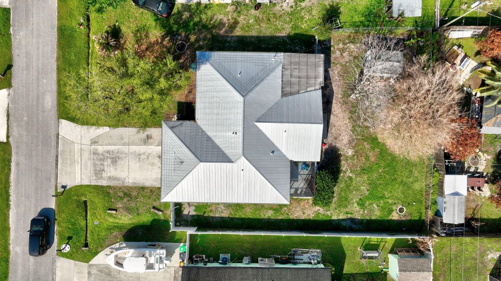 Photo of 841 SE Cavern Avenue, Port Saint Lucie, FL 34983 (MLS # B26003964)