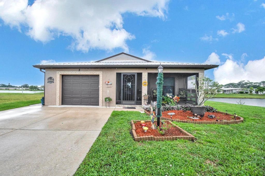 Photo of 8 Nuestra Isla, Fort Pierce, FL 34951 (MLS # R11132427)