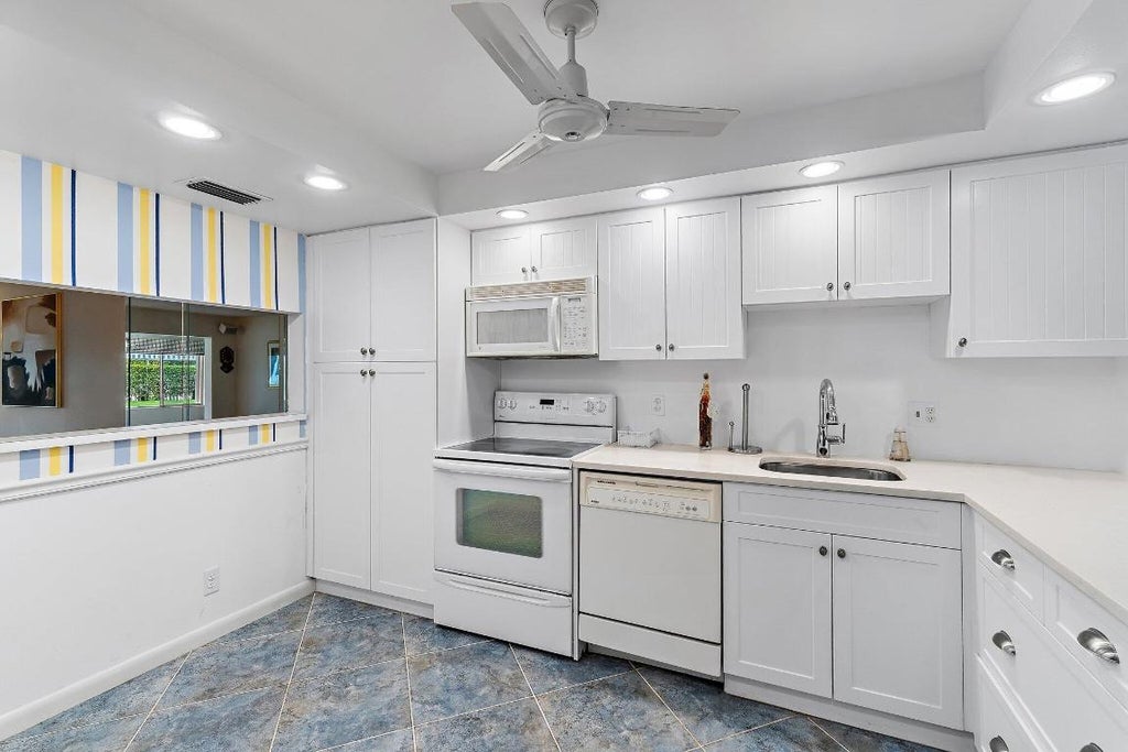 Photo of 3186 Via Poinciana #111, Lake Worth, FL 33467 (MLS # R11152048)