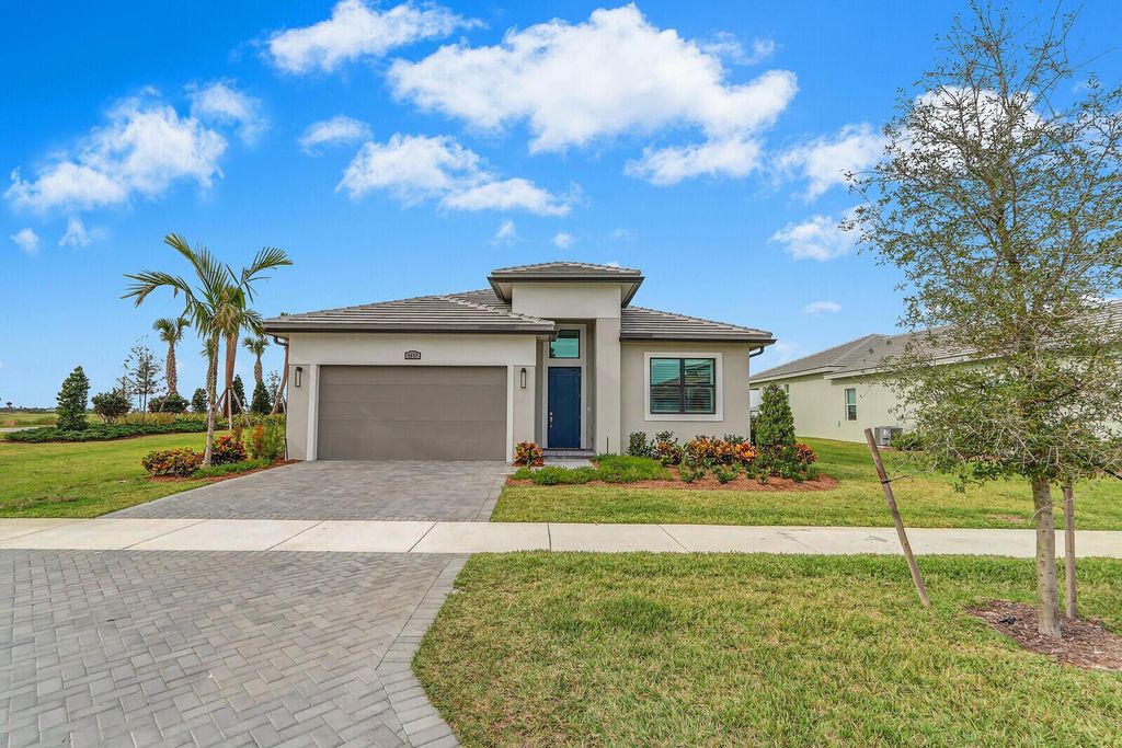Photo of 9537 SW Pepoli Way, Port Saint Lucie, FL 34987 (MLS # R11034776)