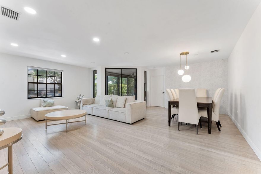 This stunning first-floor, 3-bedroom, 2-bathroom condo in Platina's pet-friendly community has ALL the major updates done — just move in and start living the Florida dream! Enter through the screened covered entry with its own private bonus storage room into a bright, open layout with beautiful flooring throughout. The renovated kitchen impresses with quartz countertops, soft-close cabinetry, stainless steel appliances, and a double sink. The primary suite features a custom-built-in walk-in closet and a spa-like bath with dual sinks, a walk-in shower, and a freestanding soaking tub.  Smart split floor plan, updated guest bath with vessel sink, mirrored closets throughout, and a glass & screen-enclosed patio. HOA includes AT&T Fiber, pest control, roof & water Platina community delivers unmatched resort-style living — 20,000 sq ft clubhouse, café, fitness center, pools, tennis, pickleball, art room & more. HOA includes AT&T Fiber, pest control, roof & water. 24-hr guard-gated community with easy I-95/Turnpike access, shopping & dining nearby.