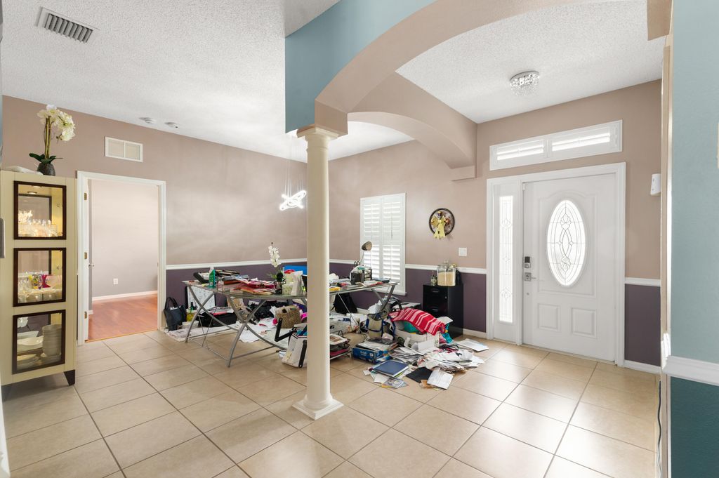 Photo of 1486 SW Crest Avenue, Port Saint Lucie, FL 34953 (MLS # R10970424)