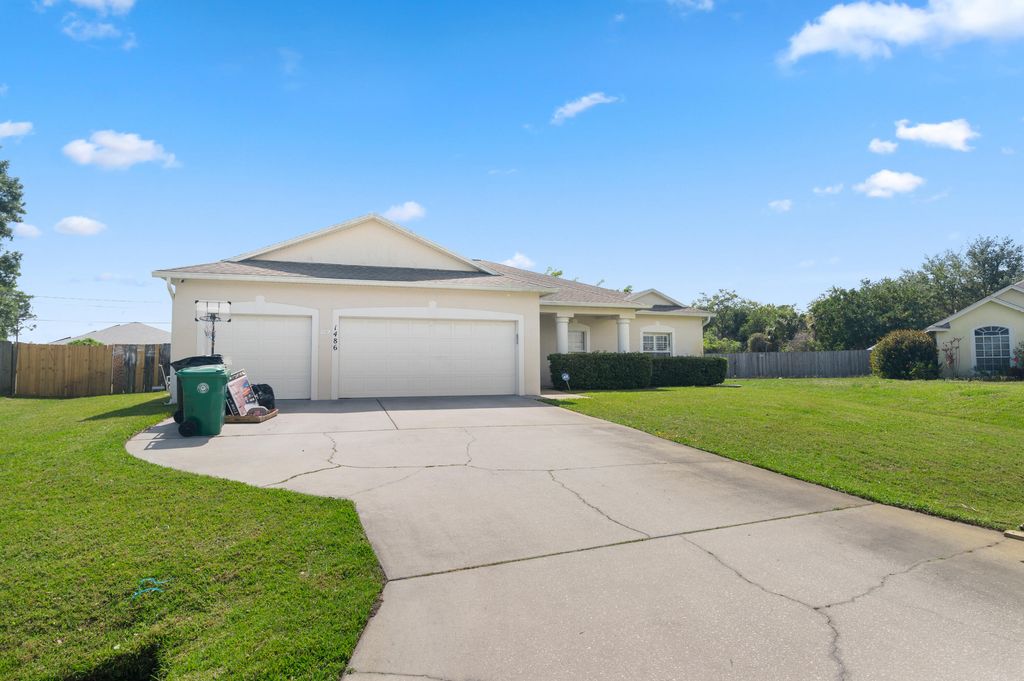 Photo of 1486 SW Crest Avenue, Port Saint Lucie, FL 34953 (MLS # R10970424)