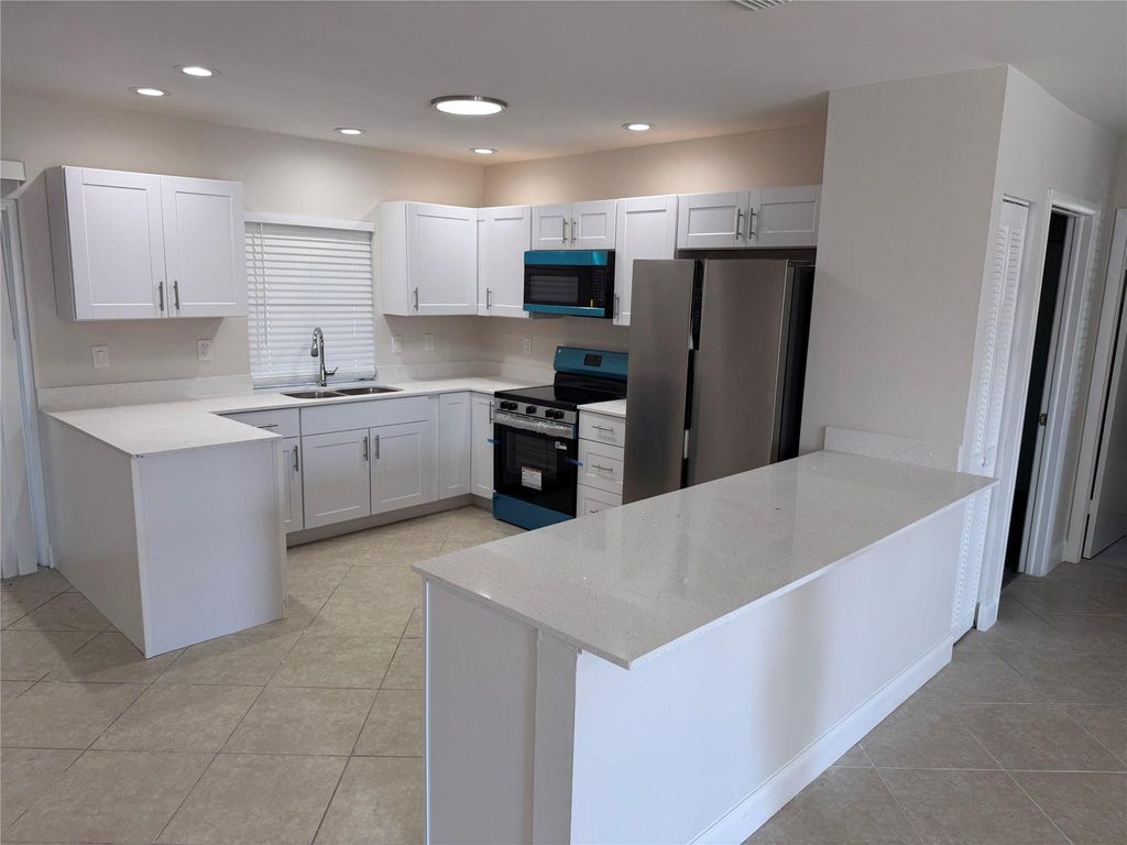 Photo of 703 SW 4th Avenue, Boynton Beach, FL 33426 (MLS # F10549428)