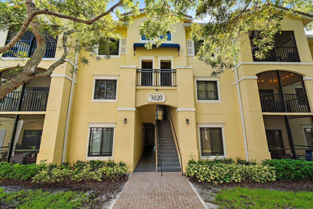 Photo of 3020 ALCAZAR Place #106, Palm Beach Gardens, FL 33410 (MLS # B26065940)