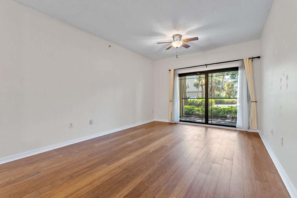Photo of 3020 ALCAZAR Place #106, Palm Beach Gardens, FL 33410 (MLS # B26065940)