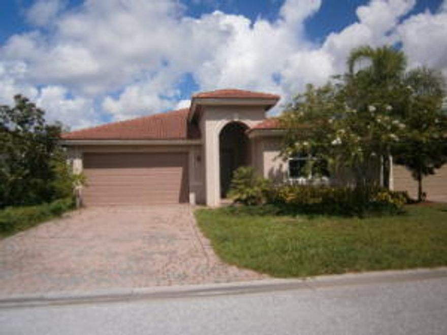 Great Waterfront Home with deep water access and dock. This home is in move in condition with nice floors in the living area and carpet in the bedrooms.  Kitchen has granite tops.