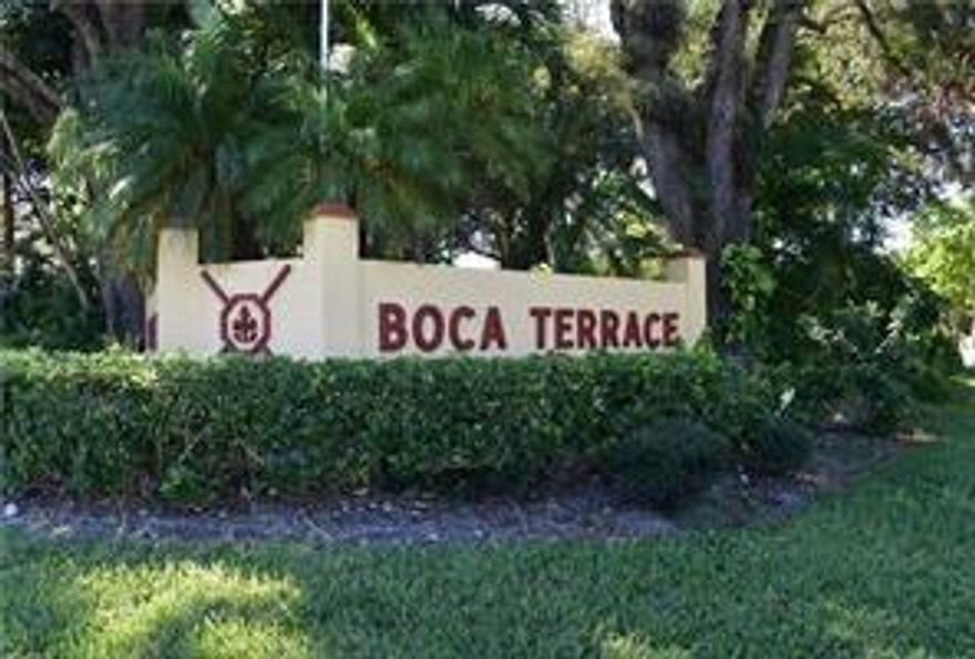 Boca Terrace is a small community of 2 story buildings with two pools, clubhouse and nice grounds.  Unit has washer/dryer and nice layout.  Screened patio overlooks water feature.  Excellent location near parks, Town Center Mall and freeways.