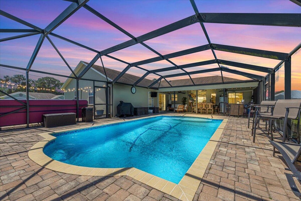 Photo of 3995 SW Kakopo Street, Port Saint Lucie, FL 34953 (MLS # R10975200)
