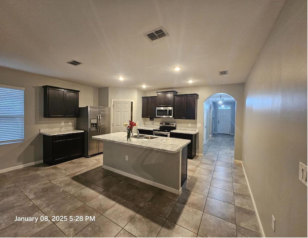 Photo of 3013 SW Segovia Street, Port Saint Lucie, FL 34953 (MLS # R11050424)