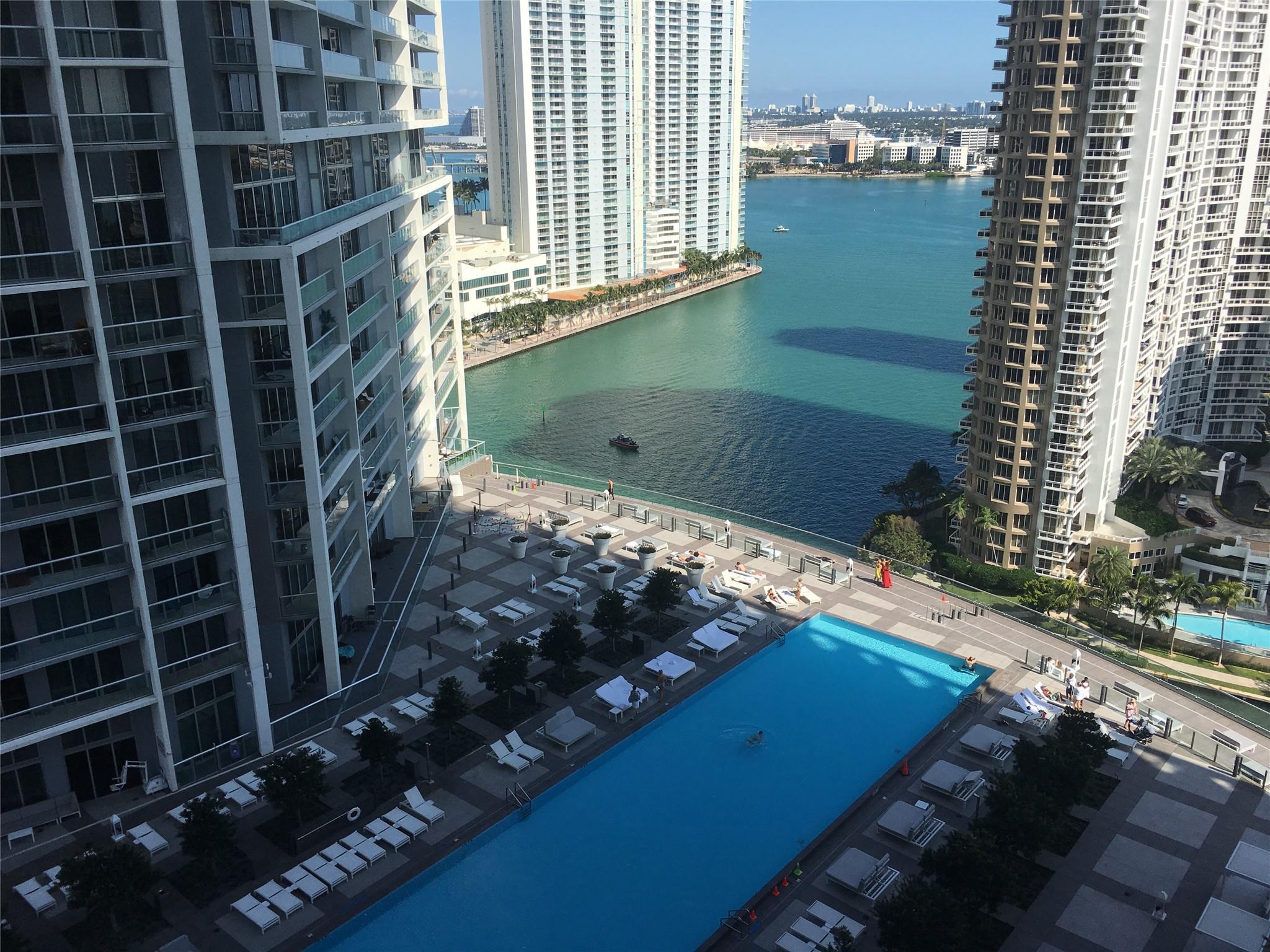 $4,200 p/month (1-year lease- incl. 100MBPs internet, HD Digital Cable 100+Ch HBO, SHO, water, garbage, GYM) Brickell Miami - Luxury Lifestyle. Beautifully FURNISHED 1 Bedroom 1 Bath w/the most amazing views. Building designed by renowned firm Arquitectonica and interiors inspired by Yoo By Philippe Starck, Icon Brickell rests on a ten-acre enclave on the edge of a 1000-foot Biscayne Bay waterfront. Step out on the balcony, and enjoy the view of the biggest infinity pool in Miami & Biscayne Bay. Icon Brickell’s three pools consist of a reflection pool, hot tub & a lap pool, and make up the longest pool complex in the US w/full restaurant. Icon Brickell Spa is a staggering 28,000 sqft, juice bar, treatment rooms for massages & a 5,000 sqft aqua-therapy lounge & fitness center.