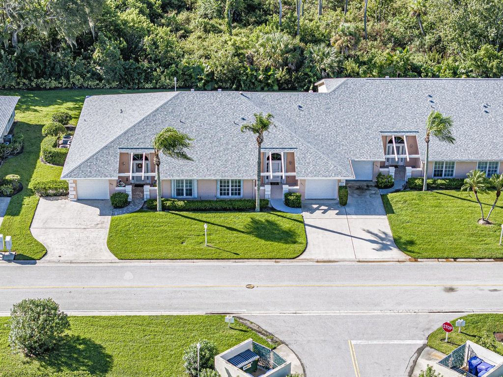 Photo of 841 Lake Orchid Circle, Vero Beach, FL 32962 (MLS # R11130509)