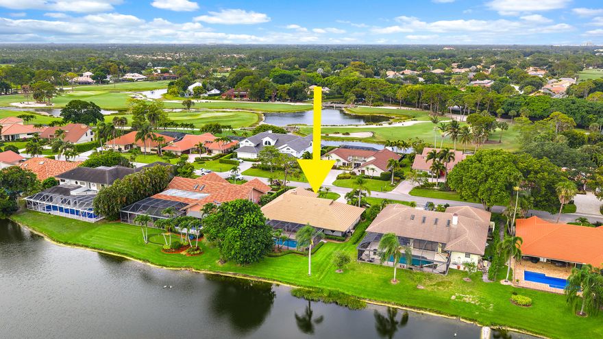 Beautifully renovated CBS home offering exceptional water, golf, bridge, and sunset views in a private cul-de-sac setting. Lushly landscaped and designed for both comfort and entertaining, this 3-bedroom plus den/office residence features a remodeled kitchen with custom cabinetry, granite countertops, hardwood floors, breakfast nook, fireplace, spacious laundry room, private spa off the primary suite, and a newly finished oversized garage with tons of storage and room for your own golf cart. Partial impact glass and full hurricane protection provide added peace of mind. A great home for entertaining, the property offers seamless indoor/outdoor living with a covered patio featuring a tongue-and-groove ceiling, while the expansive fully screened patio, pool, and loggia overlook the water.  Relax and enjoy breathtaking sunsets from this exceptional property, ideally located close to shopping, restaurants, and beautiful beaches. PGA National Resort offers well renowned golf courses along with tennis, Pickleball, spa and much more. The membership is optional.