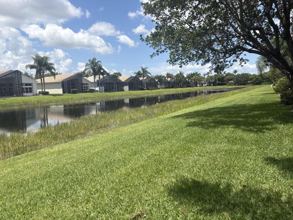 Photo of 8198 Azure Coast Boulevard, Greenacres, FL 33467 (MLS # B26026776)