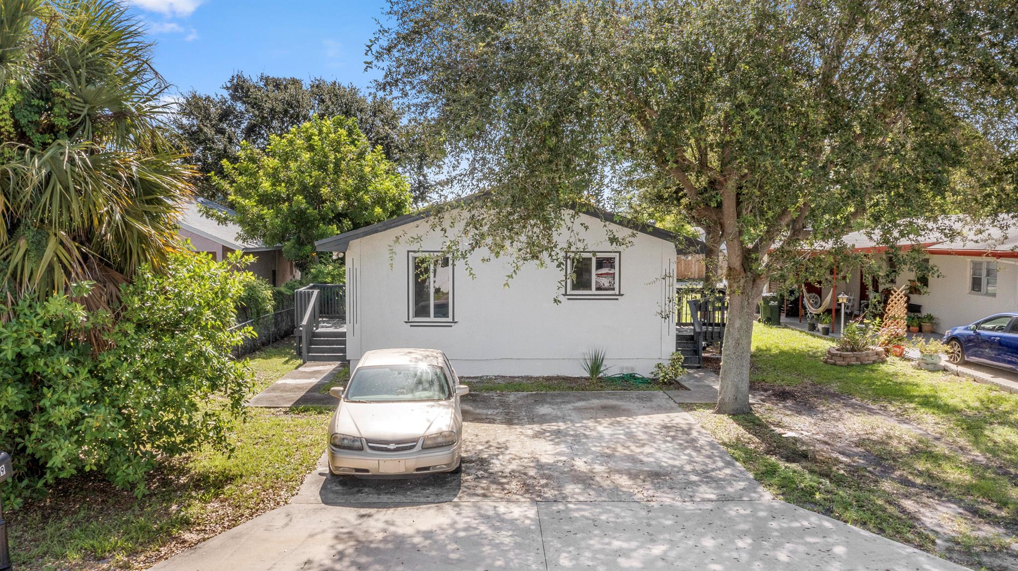 Located just one street from vibrant downtown Delray, this 4-bedroom, 2-bath home offers incredible potential and prime convenience. Featuring new laminate flooring, fresh exterior paint, stucco exterior, hurricane impact windows, and two separate entrances, it's perfect for a family, guests, or rental income. The oversized backyard has plenty of space for entertaining--or add a pool to create your own oasis. Enjoy the freedom of no HOA. The water heater is 4 years old, the AC unit is 15 years old, and the roof age is unknown. With its unbeatable location near the beach, I95, restaurants, and shops, this flexible layout home is a rare opportunity to own near the heart of Delray! Owners are in the process of packing and moving.