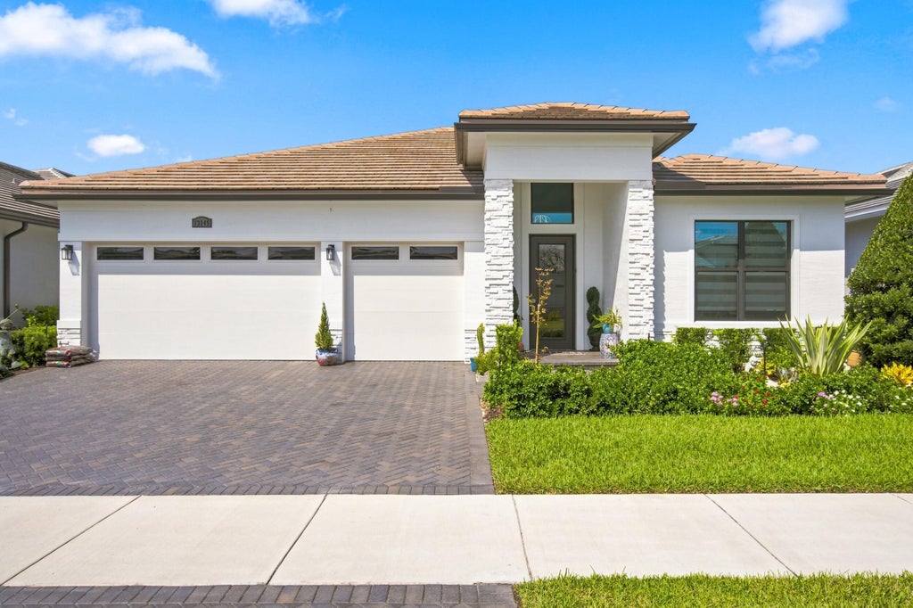 Photo of 13145 SW Shinnecock Drive, Port Saint Lucie, FL 34987 (MLS # B26062128)
