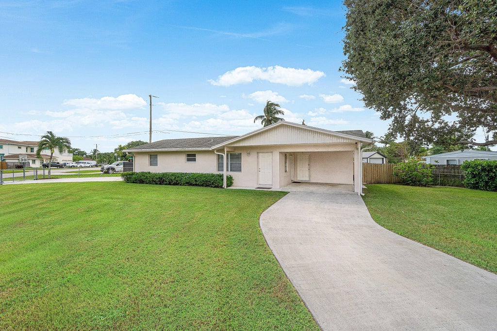 Photo of 2766 NEW YORK Street, West Palm Beach, FL 33406 (MLS # B26090432)