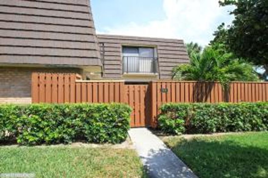 Rare townhome in Lakes at the Bluffs!  Excellent investment opportunity to own this sought after 1,200 sq ft townhome with 2 bedrooms, 2.5 baths and private courtyard, all within walking distance to the spectacular Jupiter and Juno beaches.  Open floorplan with sliding doors to the tropical courtyard from the large living/dining room.  A laundry room and half bath complete the first floor.  The second floor master suite and guest room have balconies overlooking expansive green space. Newer tile throughout, new plumbing fixtures in the second full bath, as well as new AC and Hot Water Heater units.  This will not last!