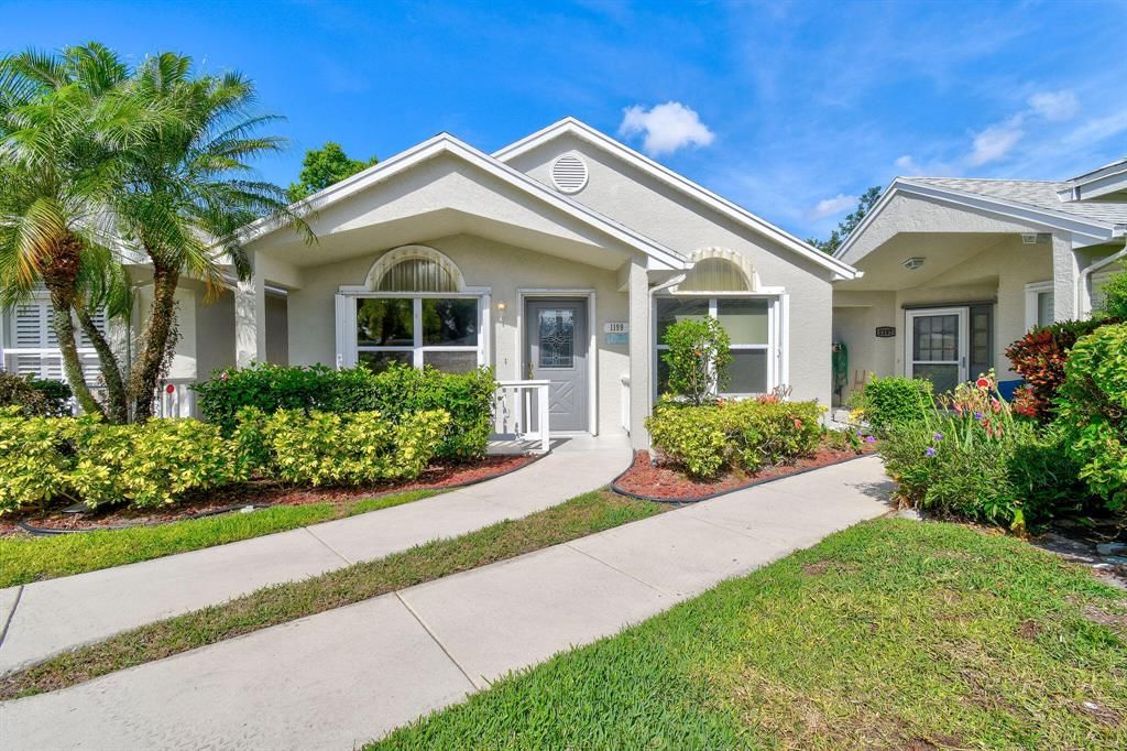 Photo of 1199 NW Lombardy Drive, Port St Lucie, FL 34986 (MLS # R10877021)