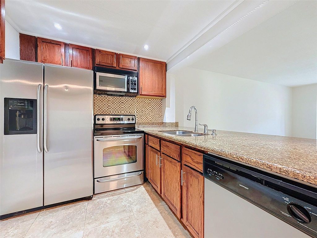 Photo of 4168 NW 90th Avenue #106, Coral Springs, FL 33065 (MLS # F10492349)