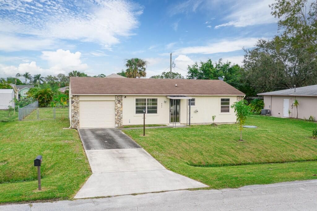 Photo of 849 SE Celtic Avenue, Port St Lucie, FL 34983 (MLS # R10849012)