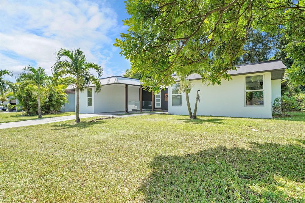 Photo of 7200 NW 68th St, Tamarac, FL 33321 (MLS # F10518534)
