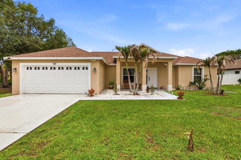 Photo of 713 NW Biscayne Drive, Port Saint Lucie, FL 34983 (MLS # B26037349)