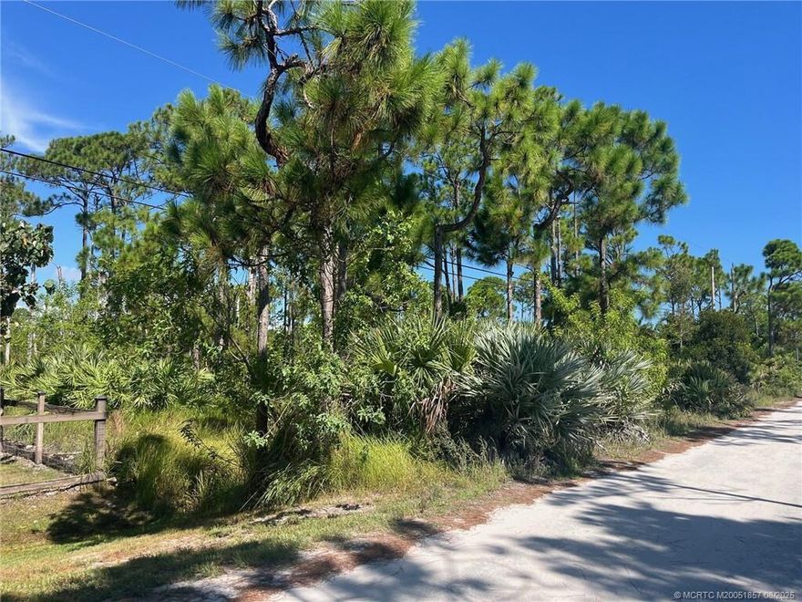 Ready to build your custom home? Discover the perfect blend of country charm and coastal convenience with this beautiful 1.16 acre lot. Nestled on a scenic road lined with charming homes and sprawling farms, this property offers the ideal setting to build your dream home, start a hobby farm, or simply enjoy the peace & privacy of country living. NO HOA, so you will have the freedom to create the lifestyle you want. Just a short drive to the beach, shopping & dining. Have the best of both worlds...quiet rural surroundings with easy access to everything!!