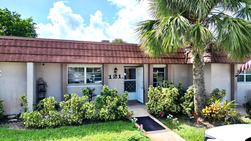 Photo of 5775 W Fernley Drive W #121, West Palm Beach, FL 33415 (MLS # B26080471)