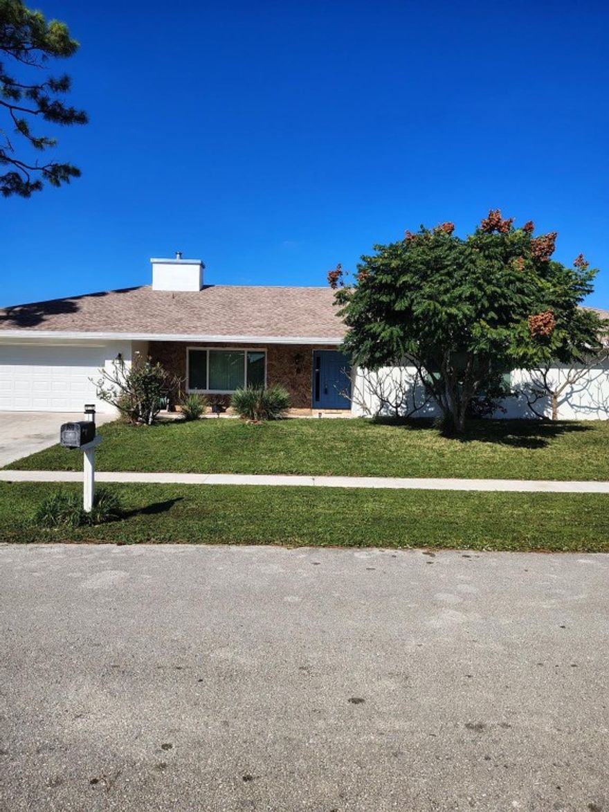 Spacious 5-Bedroom 3 Bath House in a Desirable NeighborhoodLocated in a quiet, friendly, voluntary HOA neighborhood. This residence is ideal for families seeking both tranquility and convenience and is only about 8 miles from the beach. Conveniently located near cultural centers, great restaurants and downtown West Palm Beach. This house has a New Roof, New Hurricane rated Windows, Sliding doors, Exterior doors, and Garage door, New Diamond bright and skimmer in pool and spa, New Tile flooring, New Baseboards, Updated Kitchen cabinets. New LED lighting, New Paint throughout, New Garage floor coating, New Garage door opener, and New Perimeter fence and gates. Charming Family Home for SaleSpacious 5-Bedroom House in a Desirable NeighborhoodWelcome to your dream home! This meticulously maintained 5-bedroom, 3-bathroom house offers the perfect blend of comfort, style, and functionality. Located in a quiet, friendly, voluntary HOA neighborhood, this residence is ideal for families seeking both tranquility and convenience and is only about 8 miles from the beach. Conveniently located near cultural centers, great restaurants and downtown West Palm Beach.Key FeaturesRenovated house. New Tile flooring, New Baseboards, Updated Kitchen cabinets. New LED lighting,  New Paint throughout, New Hurricane rated Windows, Sliding doors, Exterior doors, and Garage door, New Roof, New Diamond bright in pool and spa, New Garage floor coating, New Garage door opener, and New Perimeter fence and gates.• Open-Concept Living Space: The inviting living room flows seamlessly into the dining area and modern kitchen with a pass through, creating an ideal space for entertaining guests or relaxing with family.• Updated Kitchen: Enjoy cooking in a kitchen equipped with a new convection cooktop,  stainless steel appliances, granite countertops, a center island, and ample cabinet space, along with a deep well kitchen sink with an ultra quiet garbage disposal.• Spacious Bedrooms and Baths: The primary suite boasts a walk-in closet and a new 2 sink marble vanity. Four additional generously sized bedrooms provide plenty of room for rest and study. The two other bathrooms have new marble double sink  vanities; one bathroom is wheelchair accessible.• Private Backyard: Step outside to a fenced backyard oasis, perfect for barbecues, gardening, or letting children and pets play safely.• Convenient Amenities: Additional highlights include a two-car attached garage, a fire place room, central air and heat conditioning, and an enclosed newly resurfaced  pool and spa.• Beautiful flowering plants and hedges with an orange flowering Rain Tree in the front yard. • Prime Location: Close to rated schools, shopping centers, parks, and major commuter routes, making your daily routine a breeze.• Underground FPL and cable linesAdditional DetailsBedrooms     5Bathrooms     3Fire Place Room Living Space              2610 sq ftTotal Square Feet 3,499 sq ftLot Size 0.24 acresYear Built 1984Garage 2-car attached