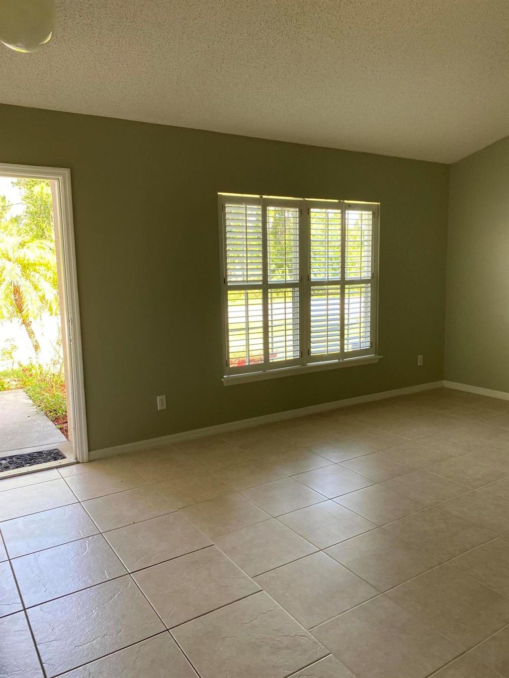 Photo of 4021 SW Rosser Boulevard, Port Saint Lucie, FL 34953 (MLS # R11019518)